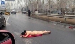 Khoả thân nằm ăn vạ ngang đường giữa trời -1 độ C